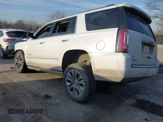2017 GMC Yukon Denali with VIN 1GKS2CKJ4HR310822, listed as a IAAI auction lot 41666174 with 101,388 mi miles. Bid and sale history available at carsss.com. Image 3.