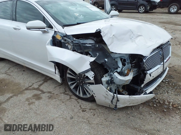 2019 Lincoln MKZ Hybrid Reserve II z VIN 3LN6L5MU1KR631351, wystawiony jako IAAI lot #41522333 z przebiegiem 82 839 mil mil oraz . Historia ofert i sprzedaży dostępna na DreamBid. Obrazek 6.
