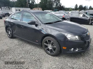 2014 Chevrolet Cruze 2LT with VIN 1G1PE5SB2E7364598, listed as a Copart auction lot 61970575 with 150,937 mi miles and Salvage title. Bid and sale history available at DreamBid. Image 4.