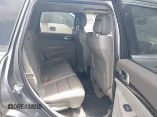 2011 Jeep Grand Cherokee Laredo with VIN 1J4RR4GG3BC595896, listed as a IAAI auction lot 42632333 with 135,426 mi miles and . Bid and sale history available at DreamBid. Image 8.