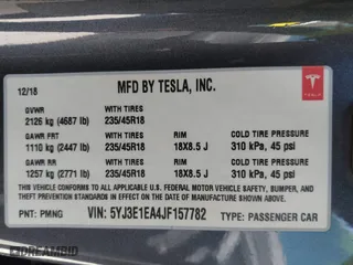 2018 Tesla Model 3 Long Range Battery with VIN 5YJ3E1EA4JF157782, listed as a IAAI auction lot 41774169 with 123,239 mi miles. Bid and sale history available at carsss.com. Image 9.