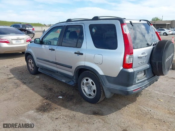 2005 Honda CR-V LX with VIN JHLRD68565C015724, listed as a IAAI auction lot 42021737 with 207,142 mi miles. Bid and sale history available at carsss.com. Image 3.