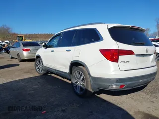 2016 Honda Pilot Touring with VIN 5FNYF6H98GB017079, listed as a IAAI auction lot 42055272 with 142,726 mi miles and . Bid and sale history available at DreamBid. Image 3.