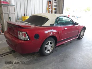 2003 Ford Mustang Deluxe z VIN 1FAFP44403F407592, wystawiony jako IAAI lot #42409746 z przebiegiem 211 269 mil mil oraz . Historia ofert i sprzedaży dostępna na DreamBid. Obrazek 4.