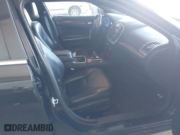 2012 Chrysler 300 Limited with VIN 2C3CCACG3CH254017, listed as a IAAI auction lot 42179843 with 197,551 mi miles and . Bid and sale history available at DreamBid. Image 5.