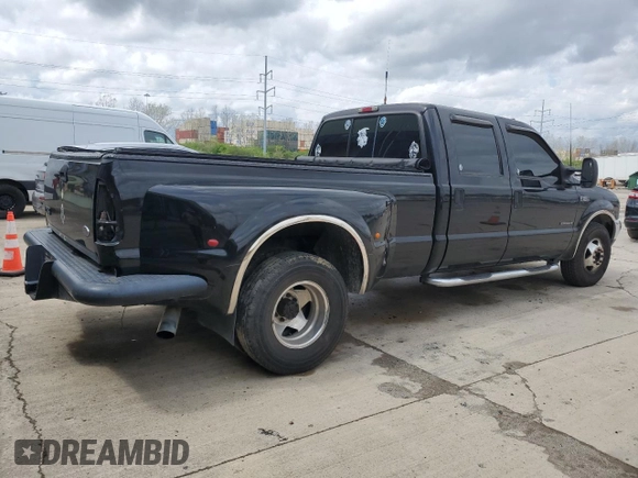 2001 Ford F-350 XL with VIN 1FTWW32F01EA68170, listed as a Copart auction lot 53516435 with 302,516 mi miles and Salvage title. Bid and sale history available at DreamBid. Image 3.