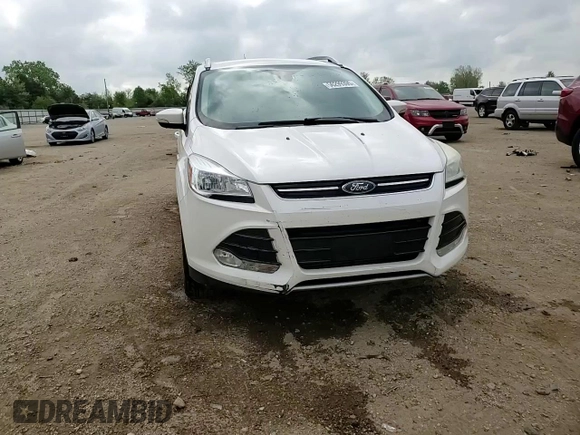 2014 Ford Escape Titanium с VIN 1FMCU0J93EUC35437, выставлен на аукционе Copart как лот 56299395 с пробегом 130 770 миль миль и Списание • Salvage title. История ставок и продаж доступна на DreamBid. Изображение 13.