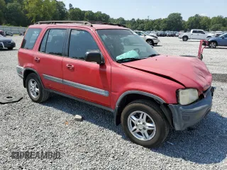 2000 Honda CR-V EX with VIN JHLRD1863YC028317, listed as a Copart auction lot 69479084 with 309,824 mi miles and Salvage Title. Bid and sale history available at carsss.com. Image 5.