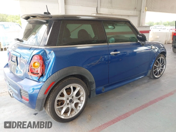 2007 MINI Hardtop S with VIN WMWMF73557TT86128, listed as a IAAI auction lot 42417311 with 114,911 mi miles and . Bid and sale history available at DreamBid. Image 4.