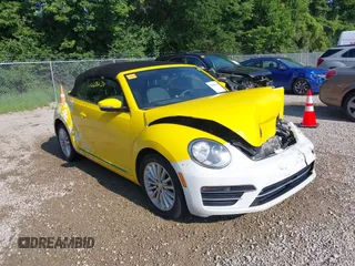 2019 Volkswagen Beetle S with VIN 3VW5DAAT0KM504778, listed as a IAAI auction lot 42638234 with 32,131 mi miles and . Bid and sale history available at DreamBid. Image 1.