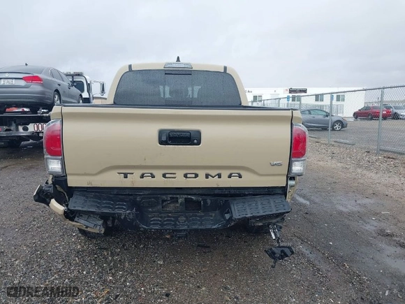 2020 Toyota Tacoma 4WD SR5 with VIN 3TMCZ5AN0LM340440, listed as a IAAI auction lot 41576373 with 98,843 mi miles. Bid and sale history available at carsss.com. Image 6.