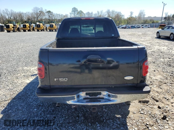 2001 Ford F-150 XLT with VIN 1FTRW07W11KE08545, listed as a Copart auction lot 49869415 with 264,349 mi miles and Salvage title. Bid and sale history available at DreamBid. Image 6.