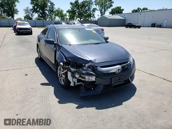 2017 Honda Civic LX z VIN 2HGFC2F55HH523474, wystawiony jako Copart lot #54933425 z przebiegiem 133 036 mil mil oraz Szkoda całkowita • Salvage title. Historia ofert i sprzedaży dostępna na DreamBid. Obrazek 13.