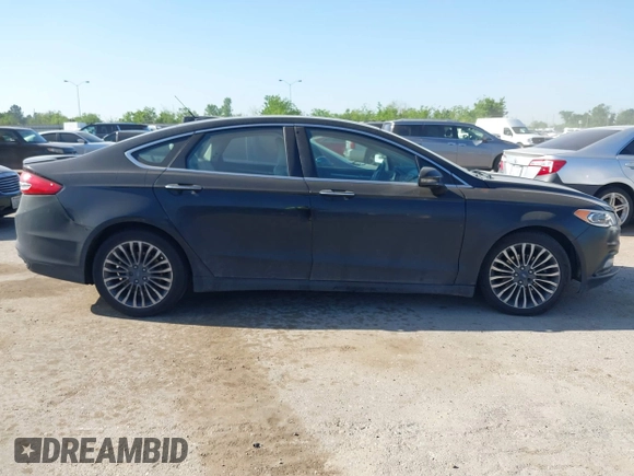 2017 Ford Fusion Titanium with VIN 3FA6P0K9XHR118057, listed as a IAAI auction lot 41982261 with 151,704 mi miles. Bid and sale history available at carsss.com. Image 13.