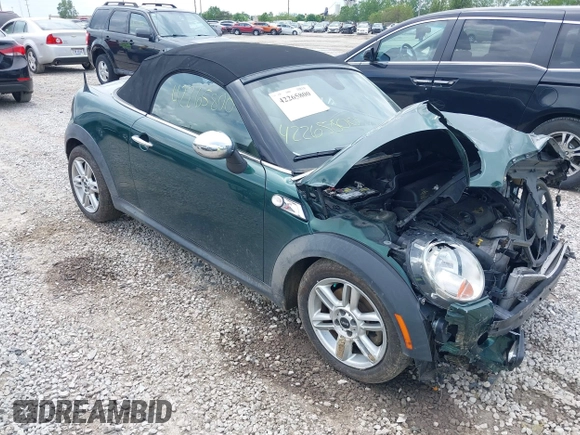 2013 MINI Roadster S z VIN WMWSY3C55DT566134, wystawiony jako IAAI lot #42265800 z przebiegiem 170 001 mil mil oraz . Historia ofert i sprzedaży dostępna na DreamBid. Obrazek 1.
