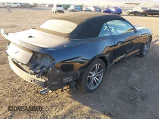 2016 Ford Mustang EcoBoost Premium with VIN 1FATP8UH8G5275027, listed as a IAAI auction lot 41634404 with 92,281 mi miles and . Bid and sale history available at carsss.com. Image 4.