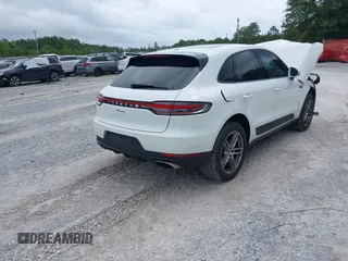 2021 Porsche Macan with VIN WP1AA2A52MLB06086, listed as a IAAI auction lot 39423611 with 56,559 mi miles and . Bid and sale history available at DreamBid. Image 4.