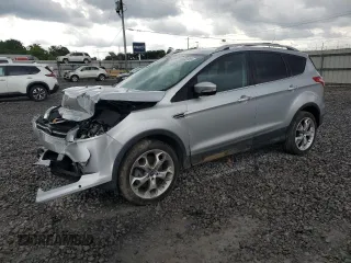 2013 Ford Escape Titanium with VIN 1FMCU9J94DUB00695, listed as a Copart auction lot 56633955 with 129,011 mi miles and Salvage title. Bid and sale history available at DreamBid. Image 1.