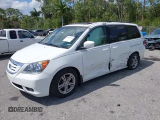 2008 Honda Odyssey Touring with VIN 5FNRL38858B006304, listed as a IAAI auction lot 41814309 with 208,778 mi miles. Bid and sale history available at carsss.com. Image 2.