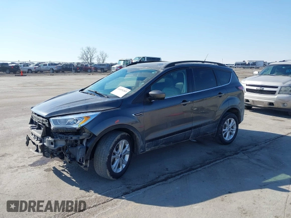 2018 Ford Escape SEL with VIN 1FMCU9HD1JUD41930, listed as a IAAI auction lot 41699203 with 114,581 mi miles. Bid and sale history available at carsss.com. Image 2.
