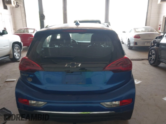 2018 Chevrolet Bolt EV Premier z VIN 1G1FX6S02J4130855, wystawiony jako IAAI lot #42249019 z przebiegiem 38 293 mil mil oraz . Historia ofert i sprzedaży dostępna na DreamBid. Obrazek 16.