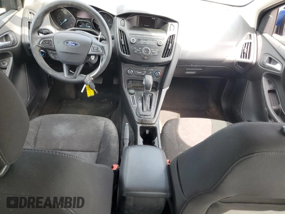 2018 Ford Focus SE z VIN 1FADP3F27JL266774, wystawiony jako Copart lot #56672825 z przebiegiem 51 980 mil mil oraz Szkoda całkowita • Salvage title. Historia ofert i sprzedaży dostępna na DreamBid. Obrazek 8.