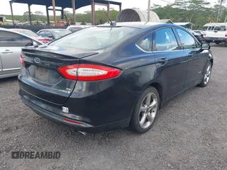 2013 Ford Fusion SE Hybrid z VIN 3FA6P0LUXDR181849, wystawiony jako IAAI lot #41949276 z przebiegiem 112 688 mil mil oraz . Historia ofert i sprzedaży dostępna na DreamBid. Obrazek 4.