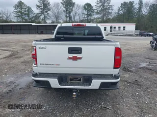 2020 Chevrolet Colorado 4WD Z71 with VIN 1GCGTDEN6L1228309, listed as a IAAI auction lot 41865357 with 100,560 mi miles and . Bid and sale history available at DreamBid. Image 16.