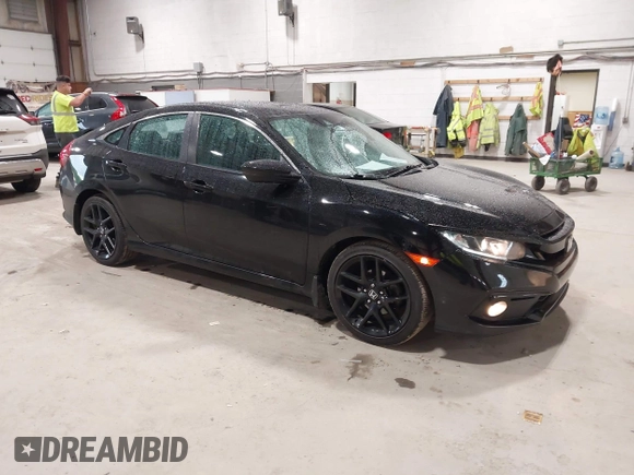 2019 Honda Civic Sport with VIN 2HGFC2F89KH557466, listed as a IAAI auction lot 42335216 with 138,747 mi miles and . Bid and sale history available at DreamBid. Image 1.