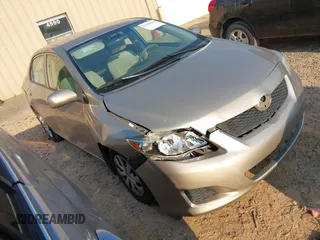 2009 Toyota Corolla z VIN 1NXBU40EX9Z125346, wystawiony jako IAAI lot #42656868 z przebiegiem 166 586 mil mil oraz . Historia ofert i sprzedaży dostępna na DreamBid. Obrazek 1.