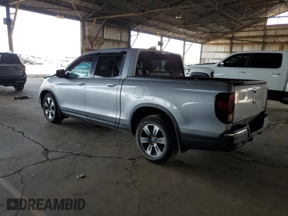 2017 Honda Ridgeline RTL-T with VIN 5FPYK2F6XHB011712, listed as a Copart auction lot 58451145 with 147,720 mi miles and Salvage title. Bid and sale history available at DreamBid. Image 2.