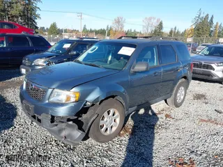 2010 Mazda Tribute Touring with VIN 4F2CY9C73AKM04595, listed as a IAAI auction lot 40797681 with 122,774 mi miles. Bid and sale history available at carsss.com. Image 17.