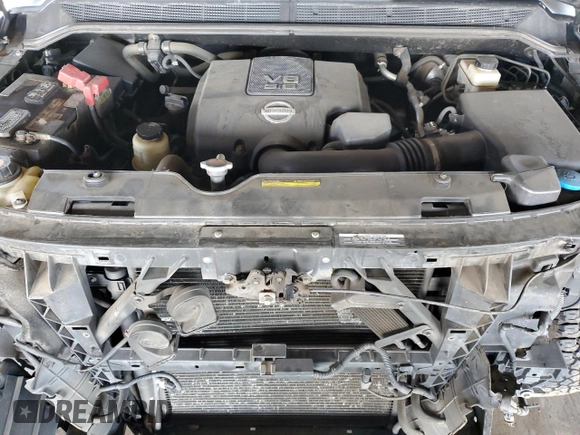 2011 Nissan Titan Pro-4X z VIN 1N6BA0EC9BN304469, wystawiony jako Copart lot #52982815 z przebiegiem 108 829 mil mil oraz Szkoda całkowita • Salvage title. Historia ofert i sprzedaży dostępna na DreamBid. Obrazek 11.