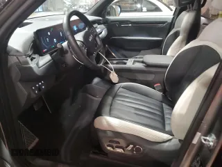 2024 Kia EV9 GT-Line with VIN KNDAEFS56R6020345, listed as a Copart auction lot 81642334 with 6,985 mi miles and Salvage Title. Bid and sale history available at carsss.com. Image 7.