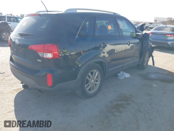 2014 Kia Sorento LX with VIN 5XYKT4A79EG482567, listed as a IAAI auction lot 41832550 with Not Provided miles and . Bid and sale history available at carsss.com. Image 4.
