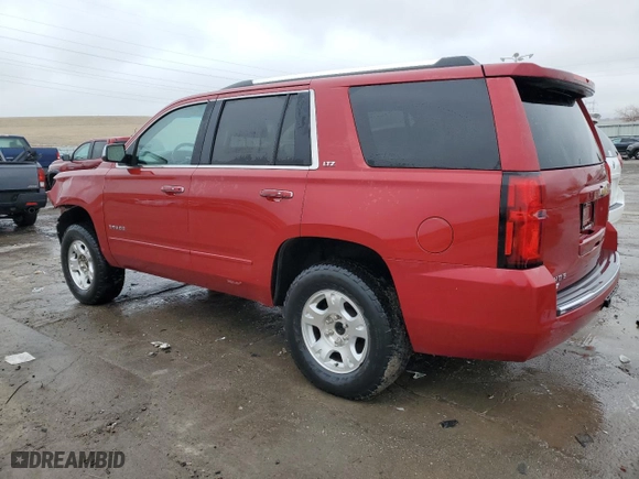 2015 Chevrolet Tahoe LTZ with VIN 1GNSKCKC8FR133323, listed as a Copart auction lot 47989525 with 123,391 mi miles and Salvage Title. Bid and sale history available at carsss.com. Image 2.