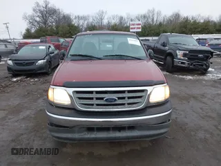 2003 Ford F-150 XL with VIN 1FTRF17223NB56888, listed as a IAAI auction lot 41151887 with Not Provided miles and . Bid and sale history available at DreamBid. Image 12.