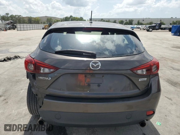 2014 Mazda 3 i Touring with VIN JM1BM1L71E1181056, listed as a Copart auction lot 59767705 with 129,447 mi miles and Salvage title. Bid and sale history available at DreamBid. Image 6.