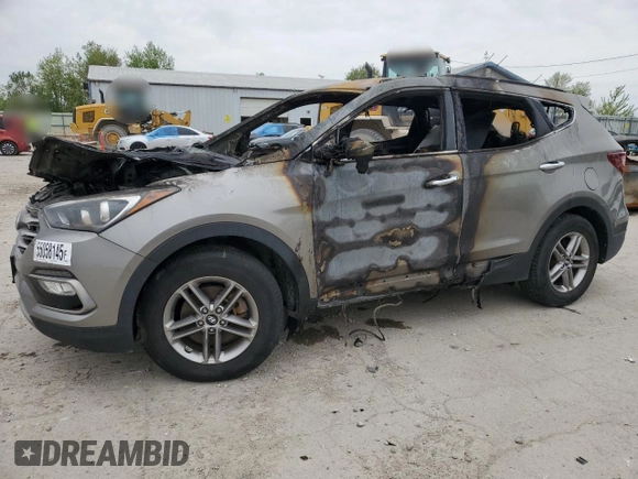 2017 Hyundai Santa Fe 2.4L z VIN 5NMZUDLB0HH042101, wystawiony jako Copart lot #55058145 z przebiegiem Nie podano mil oraz Szkoda całkowita • Salvage title. Historia ofert i sprzedaży dostępna na DreamBid. Obrazek 1.