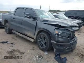 2021 Ram 1500 Lone Star with VIN 1C6RREFT2MN746770, listed as a IAAI auction lot 41360600 with 76,998 mi miles and . Bid and sale history available at DreamBid. Image 3.