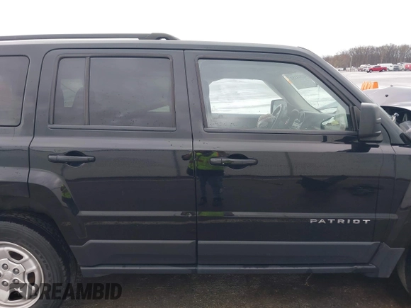 2014 Jeep Patriot Sport with VIN 1C4NJRBBXED879285, listed as a IAAI auction lot 41944152 with 103,676 mi miles. Bid and sale history available at carsss.com. Image 14.