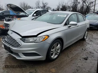 2018 Ford Fusion SE z VIN 3FA6P0H79JR270777, wystawiony jako Copart lot #45319755 z przebiegiem 69 152 mil mil oraz Szkody całkowita. Historia ofert i sprzedaży dostępna na DreamBid. Obrazek 1.