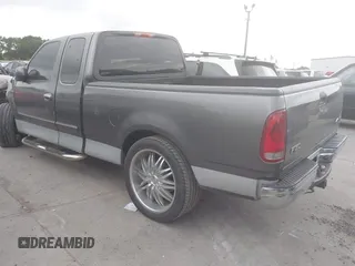 2003 Ford F-150 XL with VIN 1FTRX17W93NB63496, listed as a IAAI auction lot 42406687 with Not provided miles and . Bid and sale history available at DreamBid. Image 3.