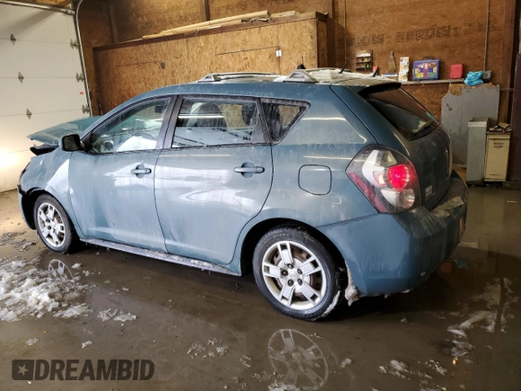 2009 Pontiac Vibe with VIN 5Y2SM67049Z437840, listed as a Copart auction lot 87366354 with 174,875 mi miles and Salvage Title. Bid and sale history available at carsss.com. Image 2.