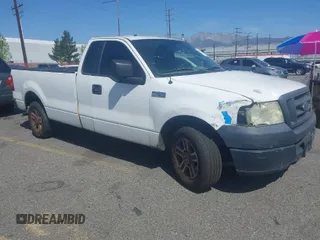 2005 Ford F-150 XL with VIN 1FTRF12W65NB10302, listed as a IAAI auction lot 41975159 with 186,186 mi miles. Bid and sale history available at carsss.com. Image 1.
