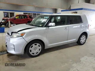 2012 Scion xB with VIN JTLZE4FE4CJ017485, listed as a Copart auction lot 53947535 with 113,979 mi miles and Salvage Title. Bid and sale history available at DreamBid. Image 1.