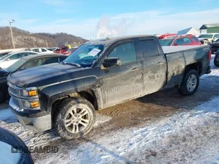 2014 Chevrolet Silverado 1500 LT with VIN 1GCVKREC3EZ168855, listed as a IAAI auction lot 41373740 with 150,659 mi miles and . Bid and sale history available at DreamBid. Image 18.