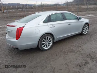 2016 Cadillac XTS Luxury Collection with VIN 2G61N5S32G9100730, listed as a IAAI auction lot 41672868 with 62,882 mi miles and . Bid and sale history available at DreamBid. Image 4.