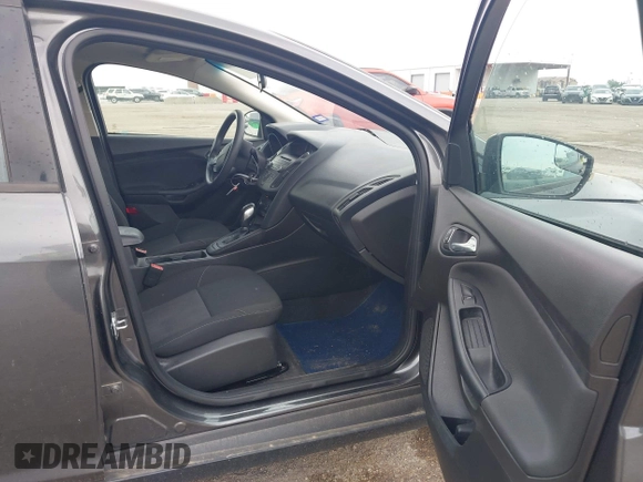 2017 Ford Focus SE z VIN 1FADP3F21HL205009, wystawiony jako IAAI lot #42305641 z przebiegiem 75 160 mil mil oraz . Historia ofert i sprzedaży dostępna na DreamBid. Obrazek 5.