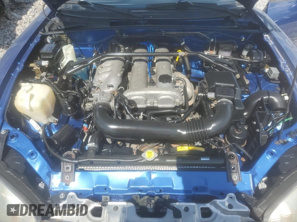 1999 Mazda MX-5 Miata with VIN JM1NB353XX0134898, listed as a Copart auction lot 63429475 with 140,595 mi miles and Clean title. Bid and sale history available at DreamBid. Image 11.